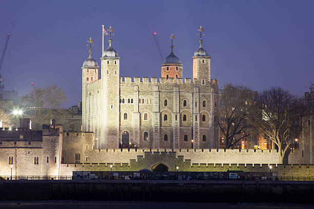istock Tower of London at night, England, UK 505603121