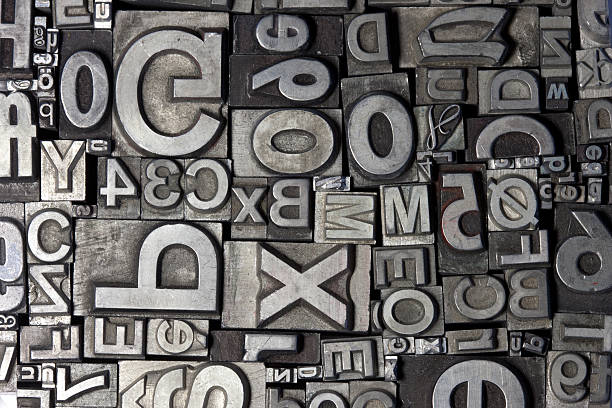 istock Random arrangement of letterpress lead letters 505603289