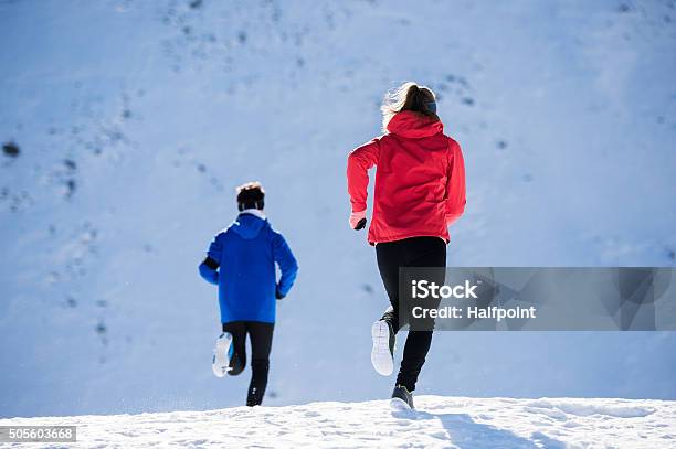 Young Couple Jogging Stock Photo - Download Image Now - Active Lifestyle, Activity, Adult