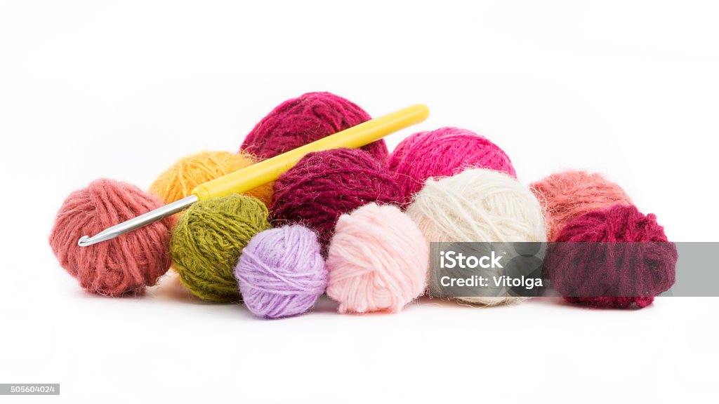 colored wool thread balls to crochet isolated colored wool thread balls to crochet  Art And Craft Stock Photo