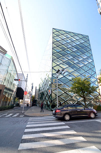 personnes marchant en magasin prada de tokyo - clothing store store prada outdoors photos et images de collection