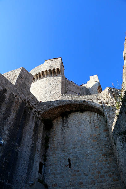 Minceta Tower Dubrovnik, Сroatia - May 30, 2015: Minceta Tower, highest point of Dubrovnik City Walls. Dubrovnik is popular touristic destination in Croatia and UNESCO World Heritage Site. fort minceta dubrovnik stock pictures, royalty-free photos & images