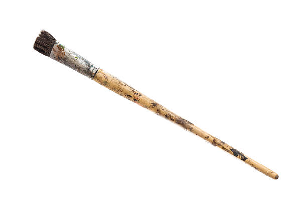 Old used paint brush isolated on white