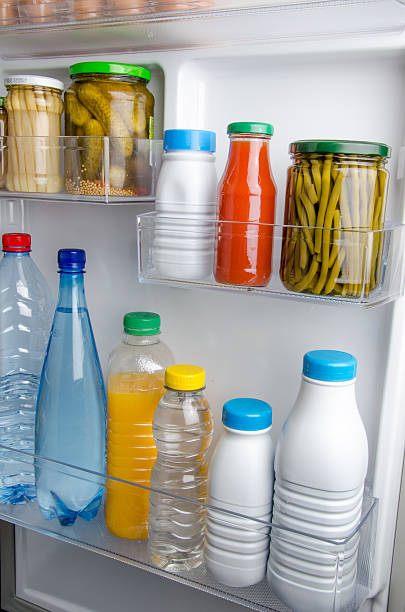 istock Bottles within the door of a refrigerator 505619353