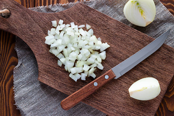istock finely chopped onion on a cutting board 505619364