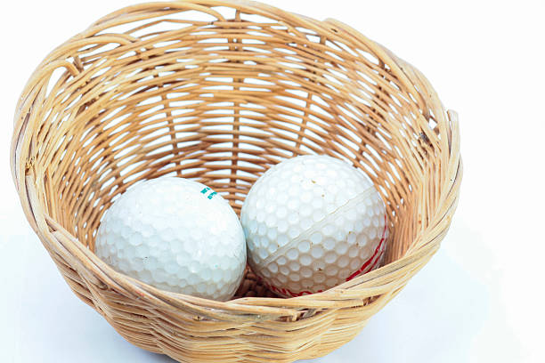 istock Golf ball in the basket 505619559