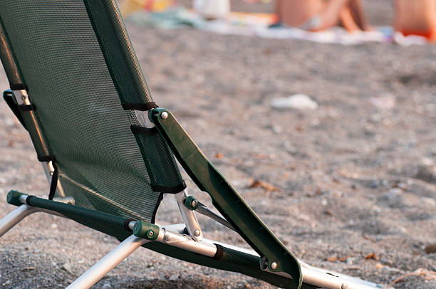 istock chair on the beach 505619668