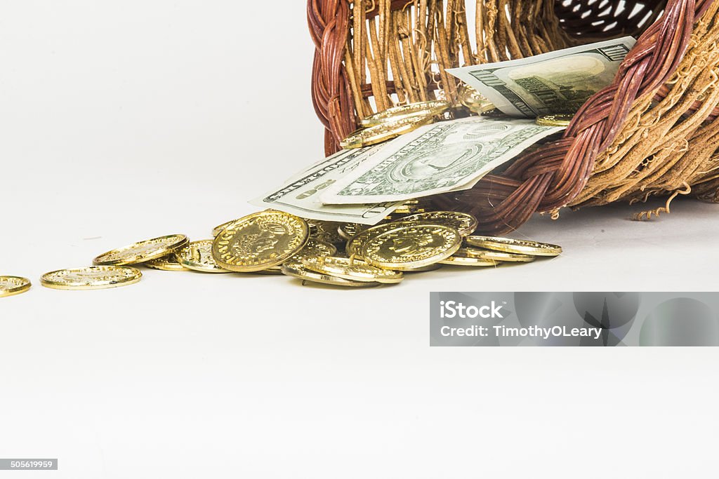 Cornucopia of Gold and Cash Gold and cash pouring out of a cornucopia Coin Stock Photo