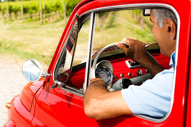 istock Senior Man In Vintage Car 505619993