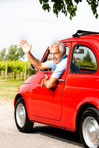 istock Senior Man In Vintage Car 505621645