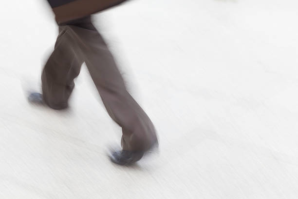 istock motion blur business people walking 505621794