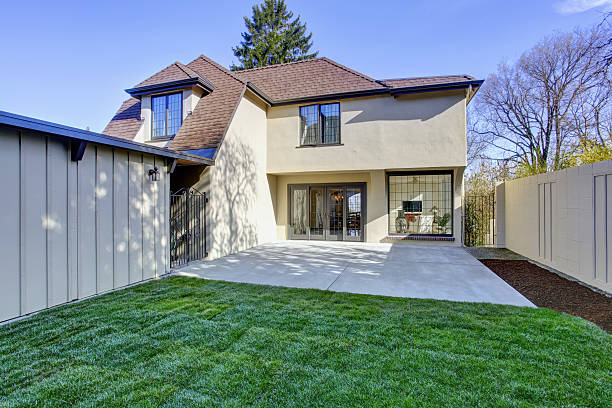 istock English tutor house exterior. Backyard view 505623343