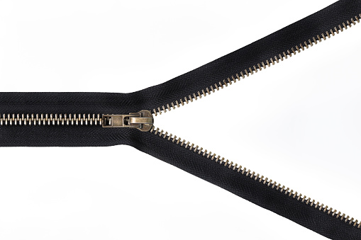 metal zipper with a black base on a white background isolation