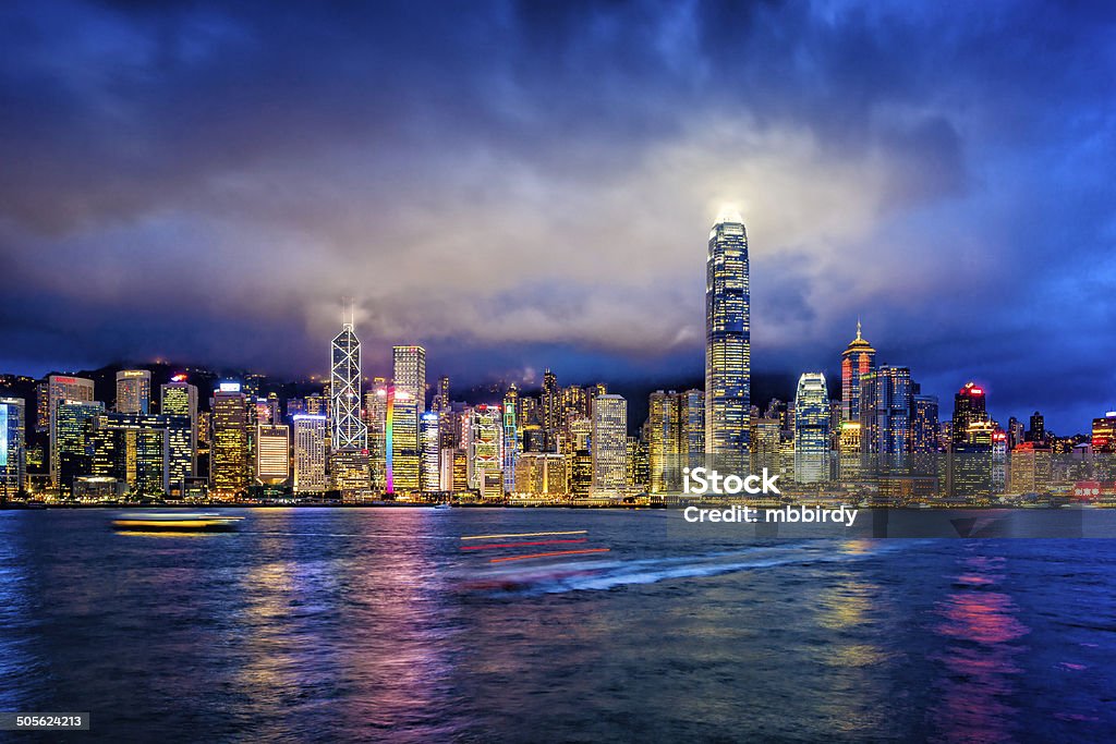 Hong Kong financial district at twilight Hong Kong financial district at twilight, Victoria Harbour, Hong Kong Island. Hong Kong Stock Photo