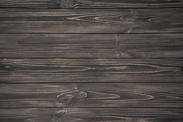 istock Dark grey wooden background 505625124