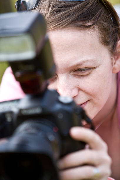 istock Woman photographer 505625538