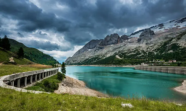 The artificial lake and pass of Fedaia (Dolomites, Trentino, Italy), at summer