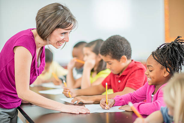 istock Teacher Answering a Child's Question 505627090