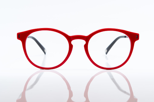 Red eye glasses isolated on white background
