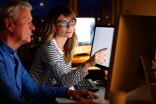 istock Business people working late night 505629460