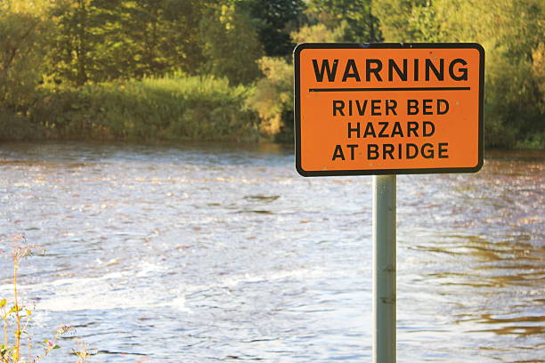 istock Warning River Bed Hazard at Bridge Sign 505632537