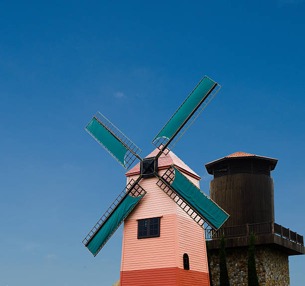 istock Wind turbine against blue sky 505633235