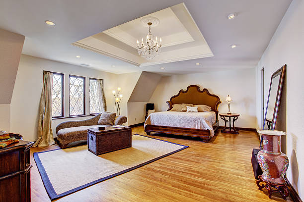 istock Bright luxury bedroom with design ceiling 505633555