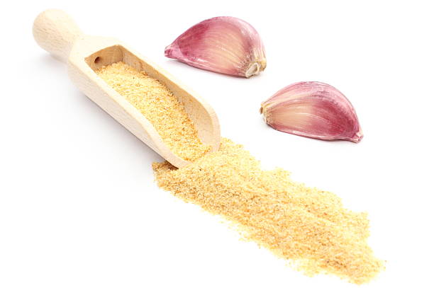 istock Garlic - fresh and loose on white background 505634049