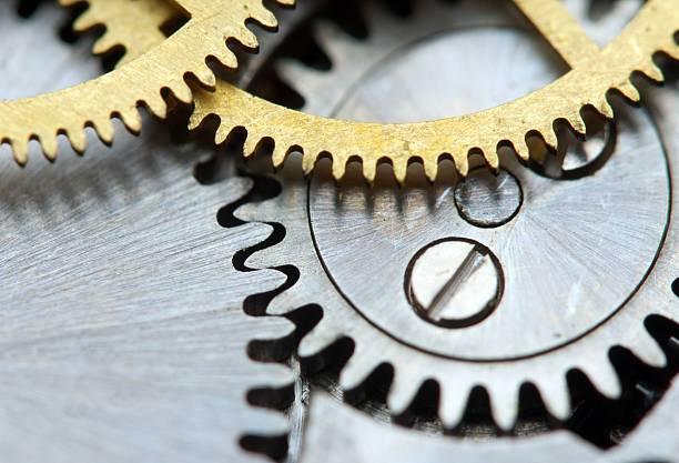 istock Metallic Background with metal cogwheels a clockwork. Macro 505634447