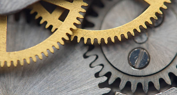 istock Metallic Background with metal cogwheels a clockwork. Macro 505634467