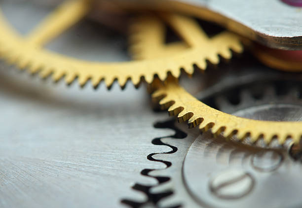 istock Metallic Background with metal cogwheels a clockwork. Macro 505634469