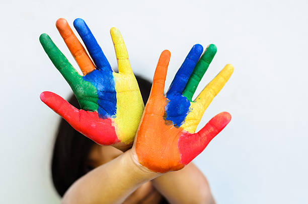 istock girl with hand painted 505634537