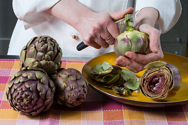 istock Preparing Jewish artichokes 505635421