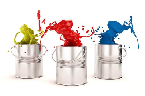 Paint splash from buckets. Isolated on white. Clipping path includedSpilled paint splash pouring from bucket. Isolated on white. Clipping path included