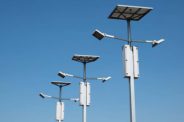 Neon colored Solar panels with copy space background. Renewable Energy concept. Horizontal shot