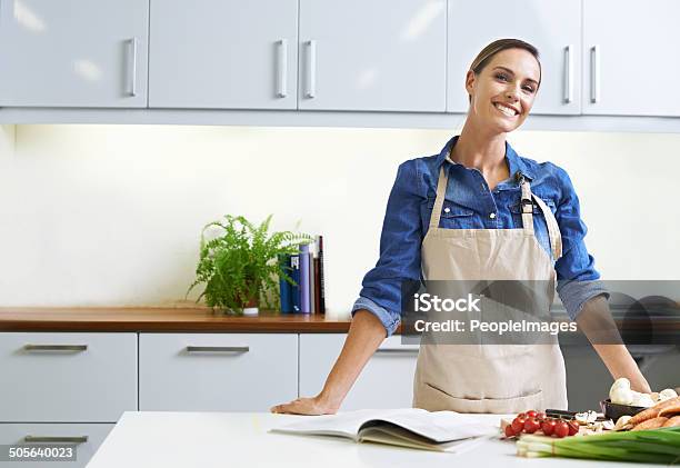 I Believe That A Homecooked Meal Is Best Stock Photo - Download Image Now - Women, One Woman Only, Kitchen