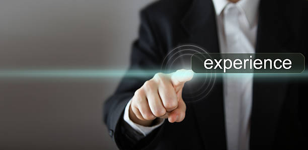 istock experience. Businessman's hand pressing the icon with text 