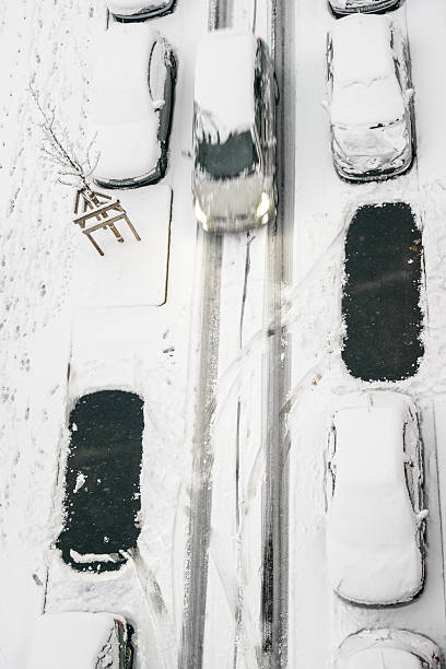istock Car Parked under the snow 505640562