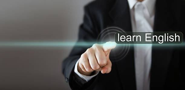 istock learn English. Businessman's hand pressing the icon with text 505640706
