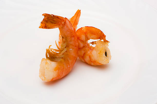 istock shrimp fried in oil laid out on a white plate 505642736
