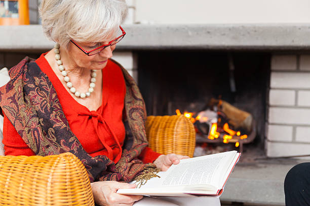 istock older senior people at home at cozy fireplace 505644466