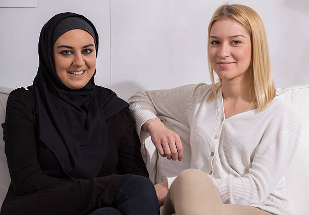 istock Muslim and her european friend 505646876