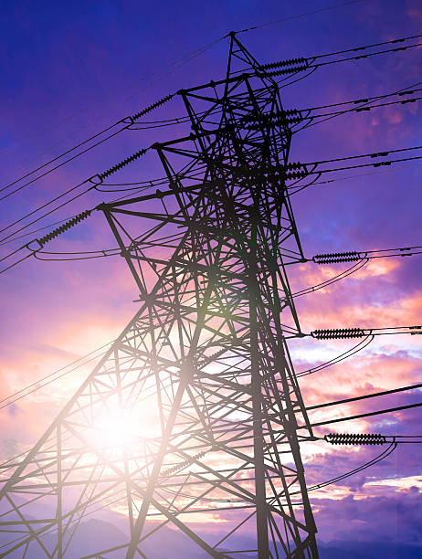 istock Silhouette of high voltage transmission towers. 505647556
