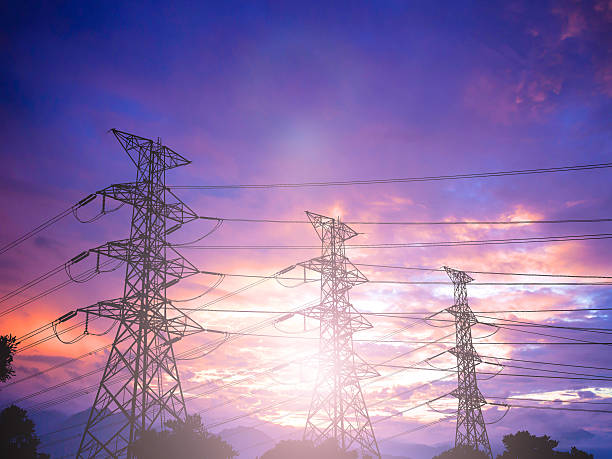 istock Silhouette of high voltage transmission towers. 505648074
