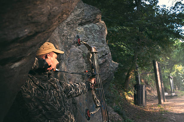istock Profile of bowman with bow and arrow. 505648196
