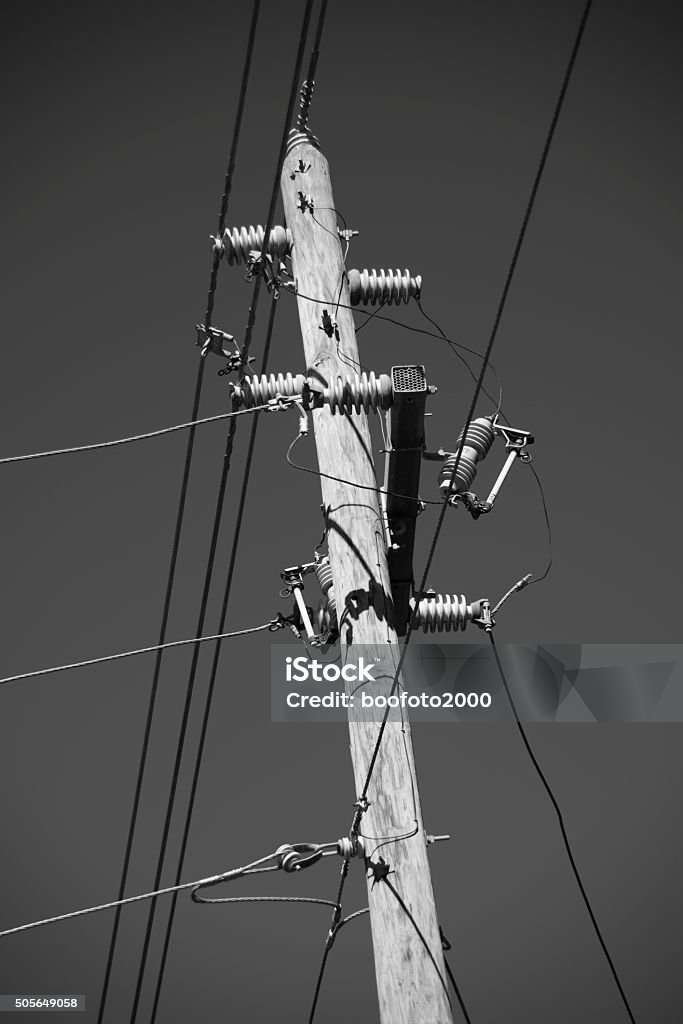 powerpole 3240 Power pole vertical black and white power lines clear sky Backgrounds Stock Photo