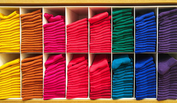 istock Colorful Horizontal Various Fluffy Bathing Towels on Wooden Shelf 505650204