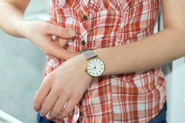 istock Girl clasps Wristwatch 505658703