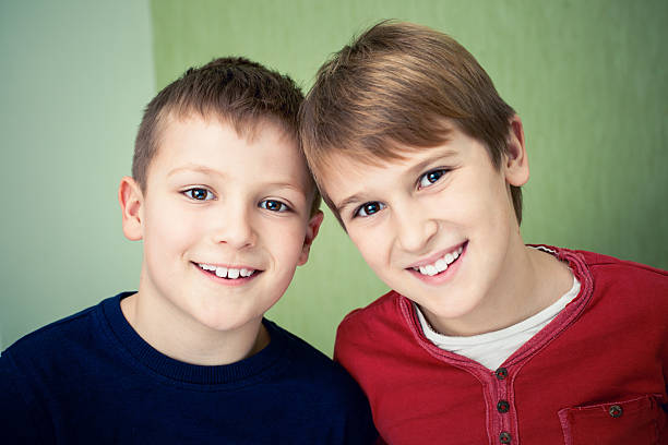 istock Happy brothers head to head 505661084