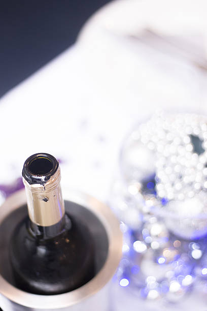 istock White wine bottle in wedding party 505662804